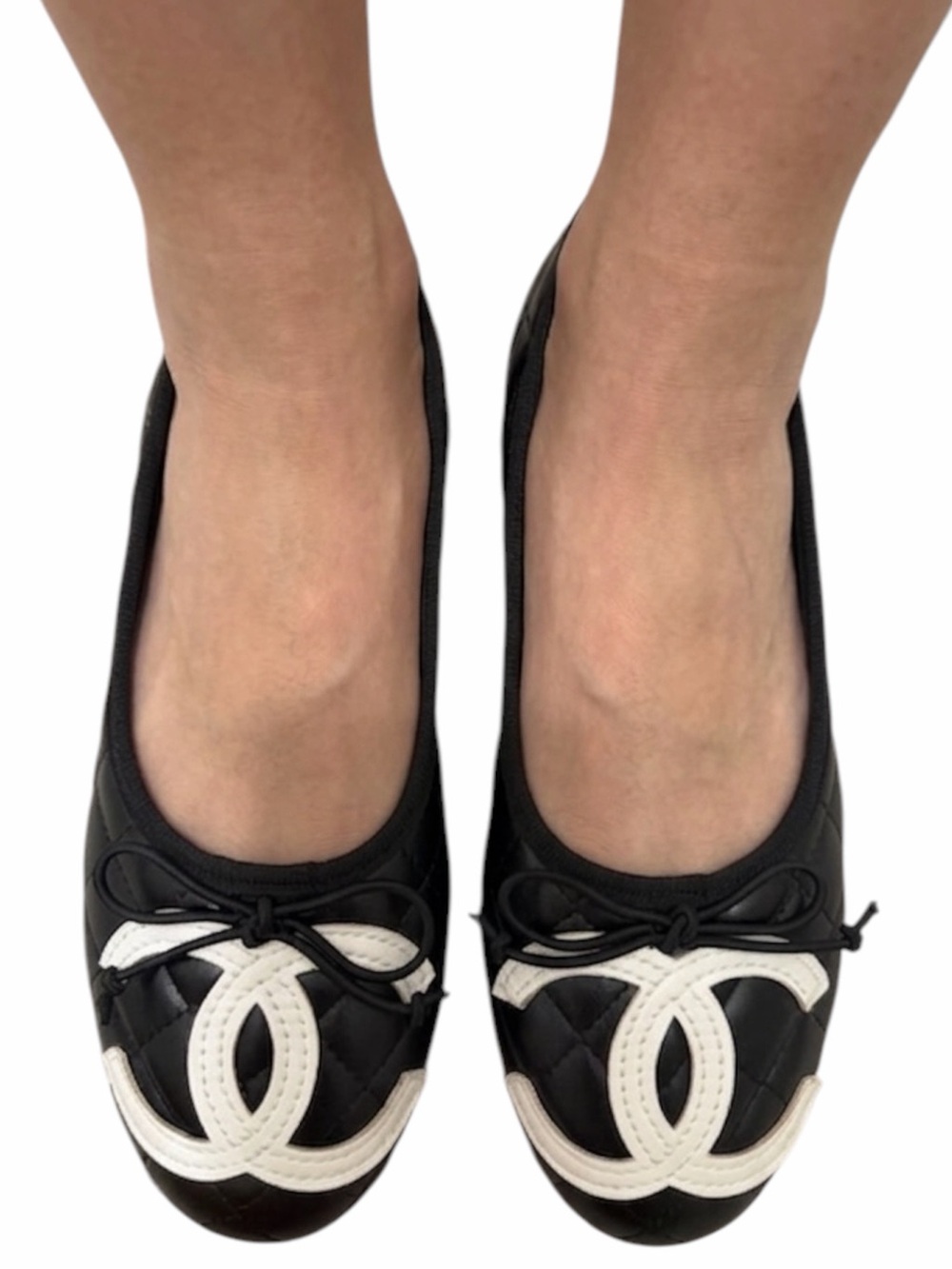 CHANEL Black Quilted Ballet Flats with White Logo Accent
